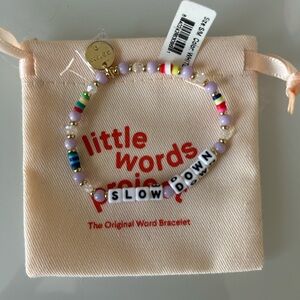 NWT little words project bracelet. Comes with a cute jewelry bag.